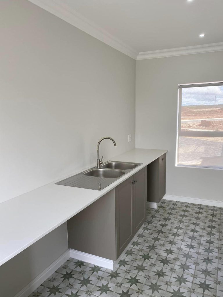 Kitchen of the Renosterbos show house. Schoeman Trio Builders residential building, Hartenbos