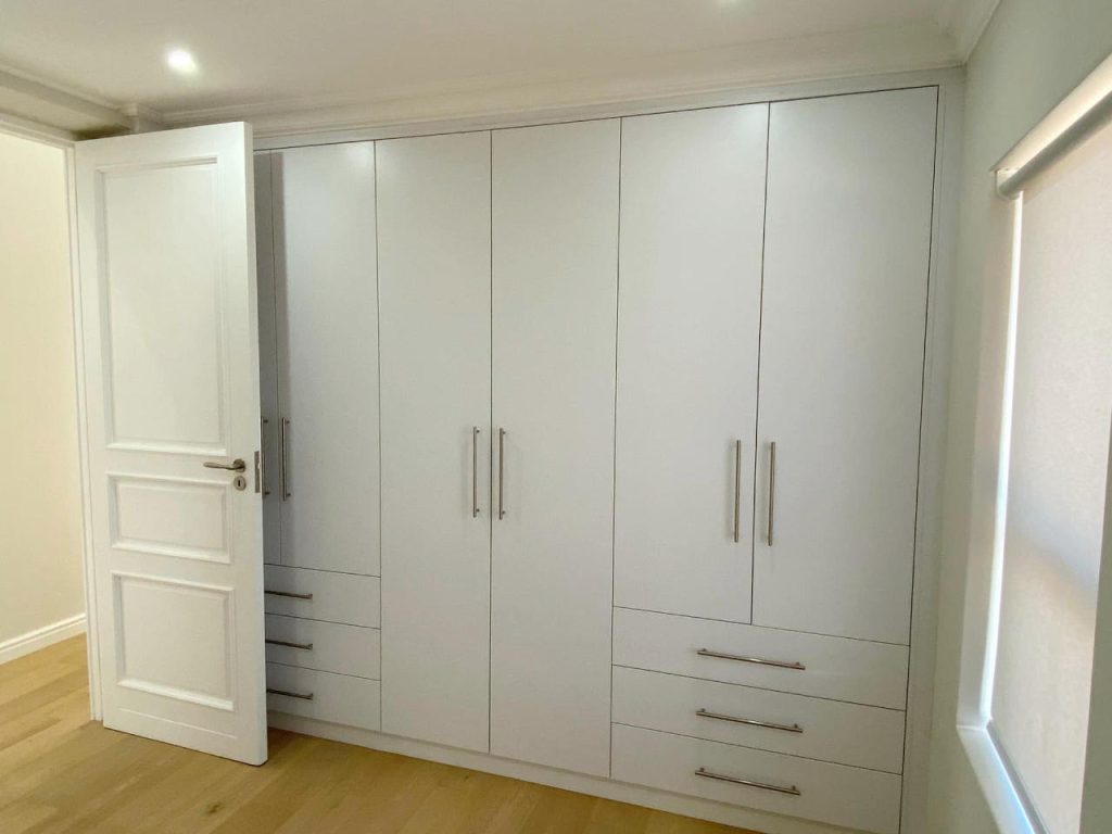 Bedroom cupboards inside the Renosterbos show house. Schoeman Trio Builders residential building, Hartenbos