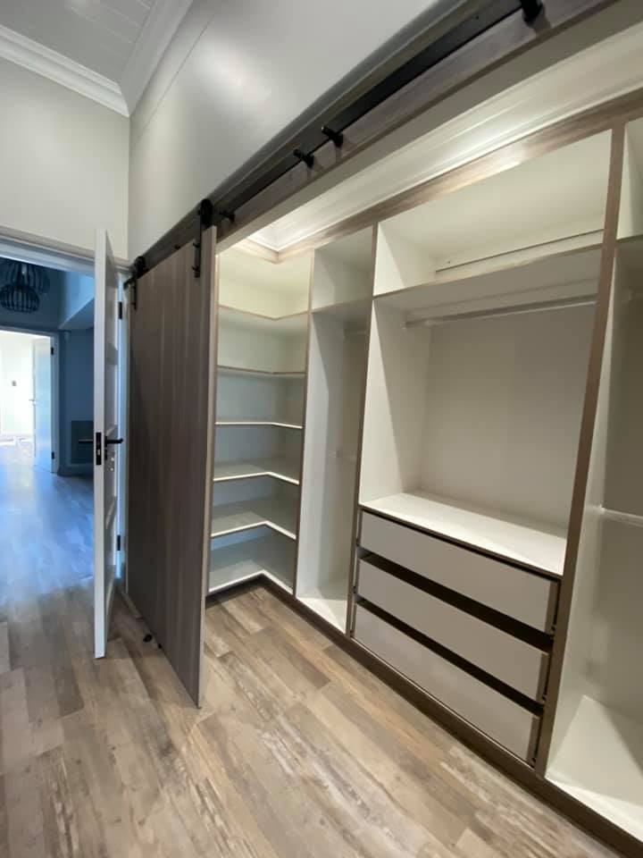 Cupboards - Stairway - New contemporary face brick construction in the Mossel Bay area by Schoeman Trio Builders