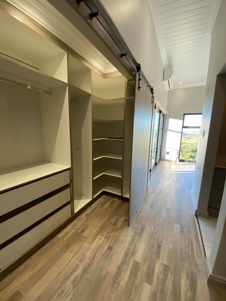 Cupboards - Stairway - New contemporary face brick construction in the Mossel Bay area by Schoeman Trio Builders