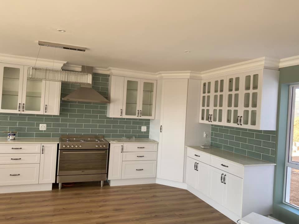 Kitchen - Newly built semi-neoclassical colonial house - Schoeman Trio Builders, Mossel Bay