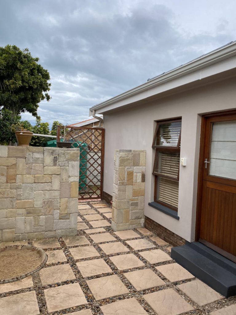 Stone wall - We construct strong buildings and support our clients with special features. Schoeman Trio Builders, Mossel Bay.