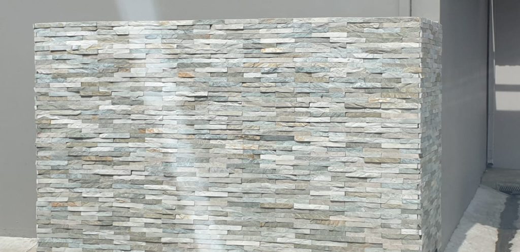 Stone wall - We construct strong buildings and support our clients with special features. Schoeman Trio Builders, Mossel Bay.