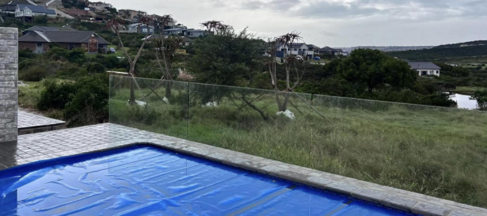 Image of newly built home's swimmingpool view, by builders Schoeman Trio at lifestyle estate Num Num, in Mossel Bay.