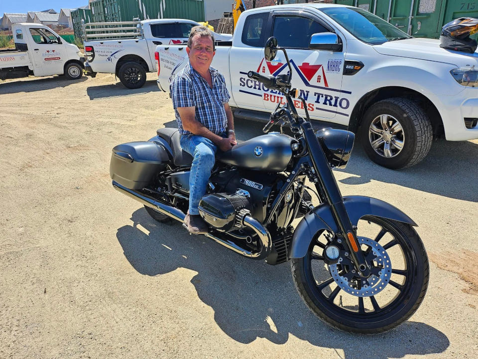 Directors Danie at the Schoeman Trio Builders company vehicles.
